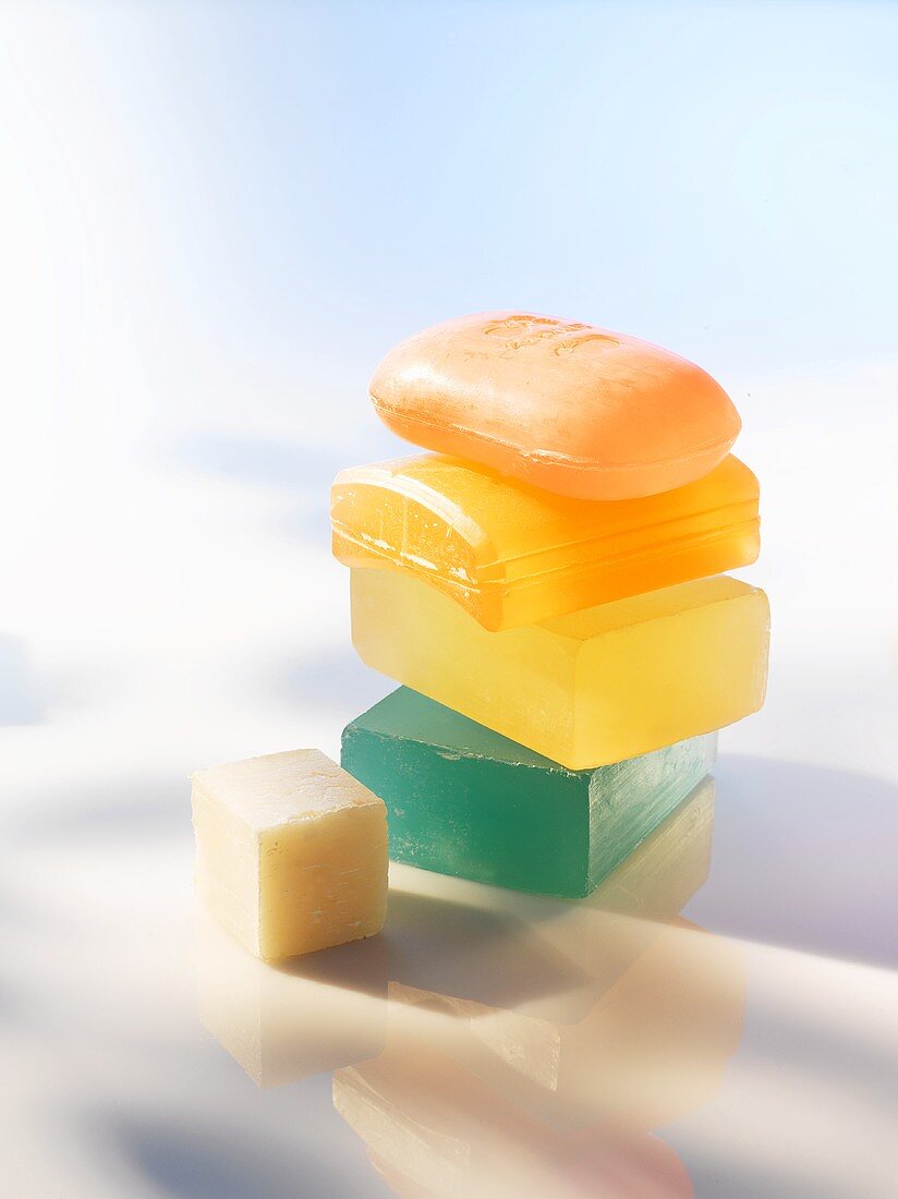 Colourful cakes of soap, stacked, close up