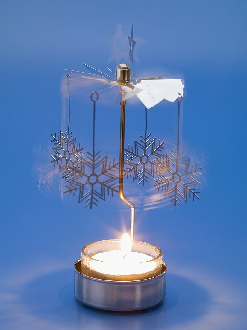 Christmas mobile over tea light