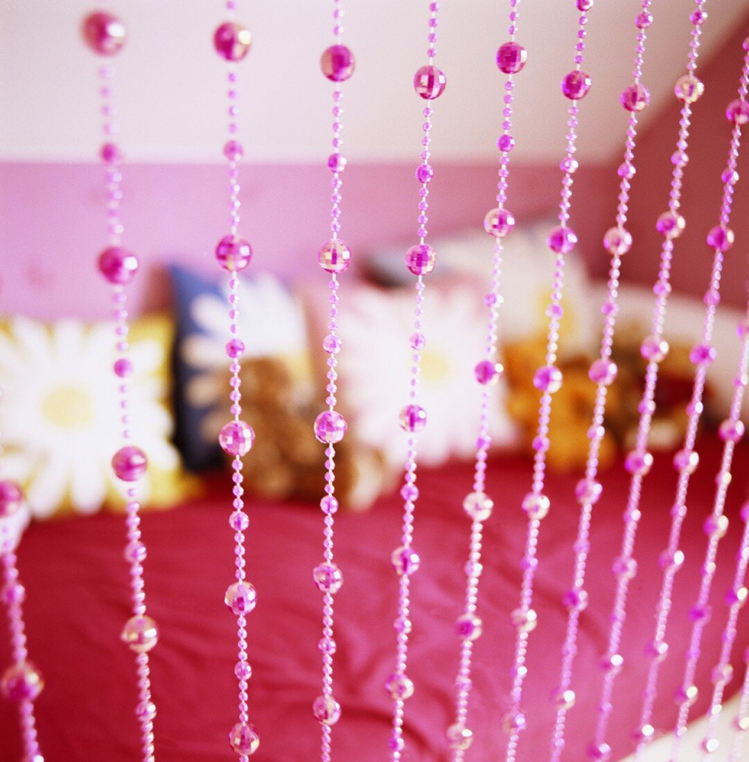 Pink bead curtain in a girl's room