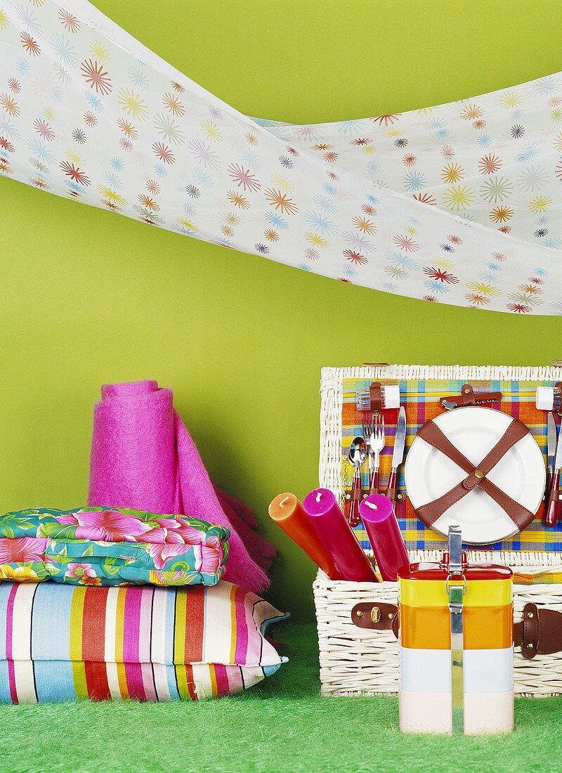 Picnic things: picnic basket, cushions, cloth and hammock