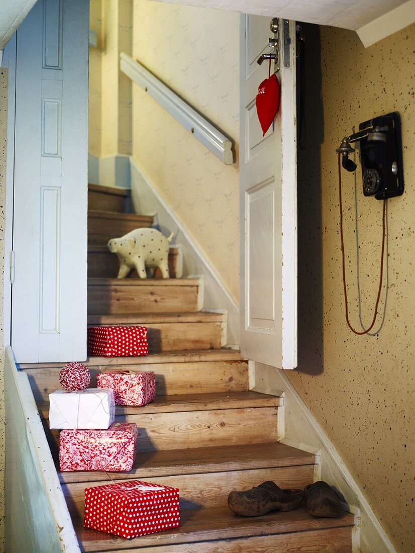 Christmas gifts on wooden staircase