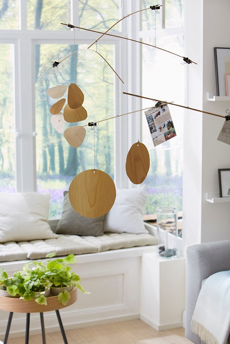 A mobile with memo holders as room decoration