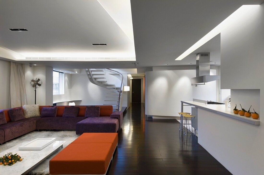 Modern interior with orange and purple furnishings