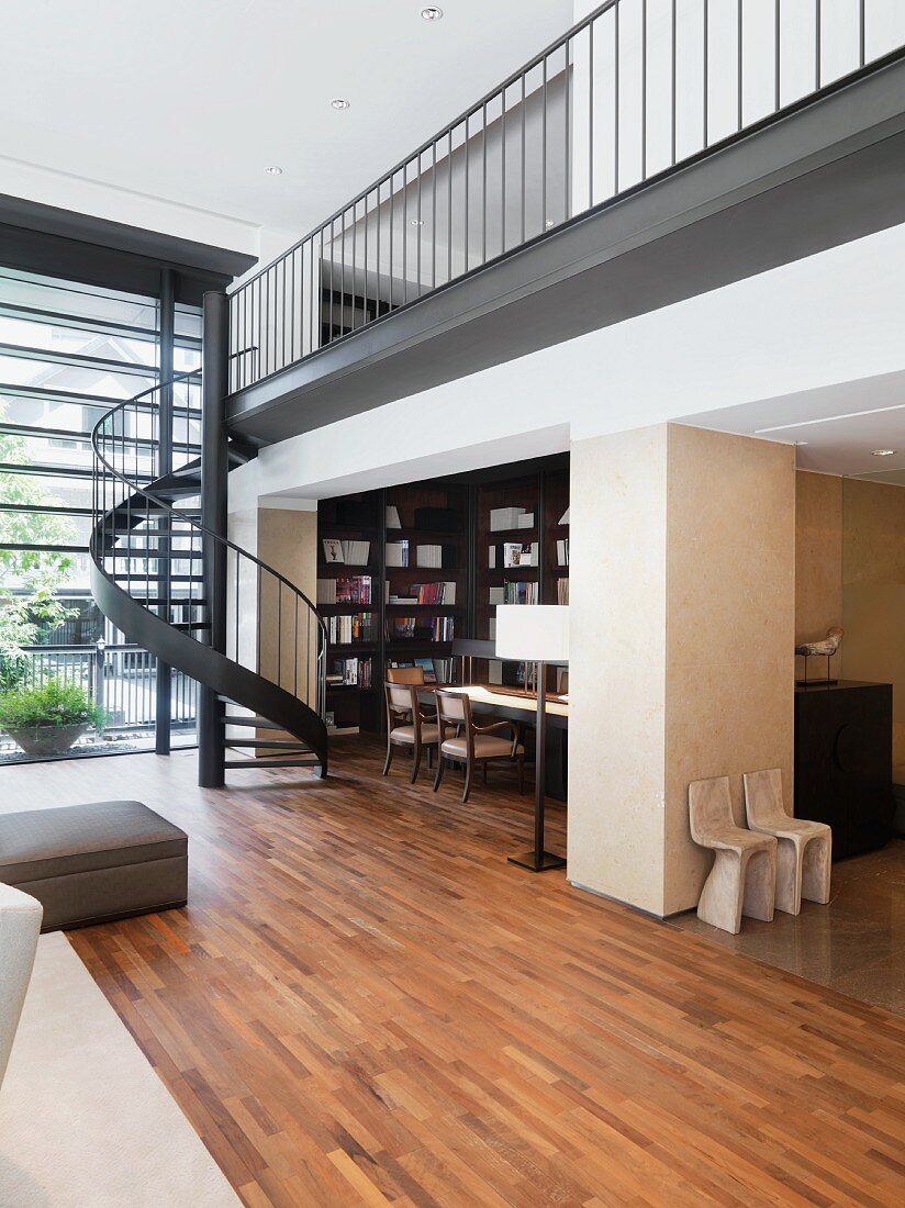 Modern interior with spiral staircase and hardwood floors