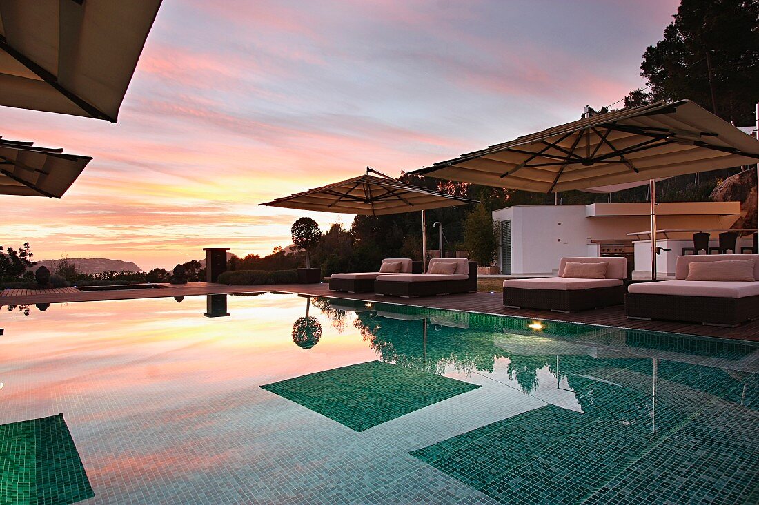 Swimming pool at sunset