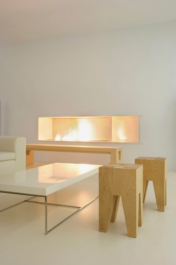 Wooden stools in white modern living room
