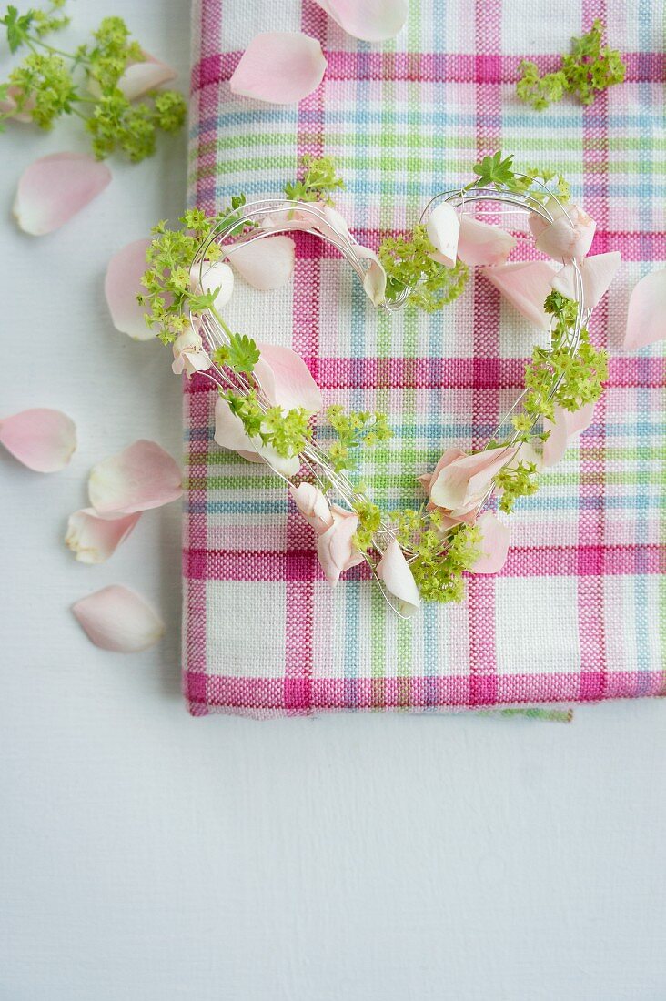A heart made from rose petals and lady's mantle