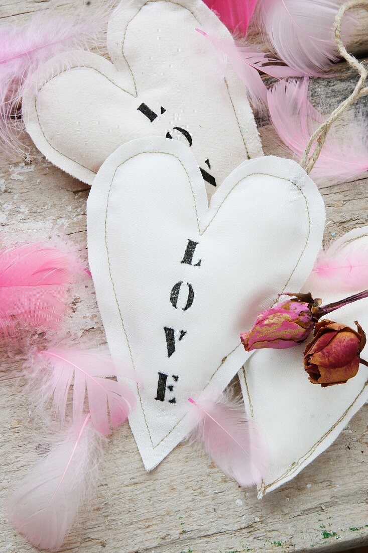 Hand-sewn fabric hearts with lettering