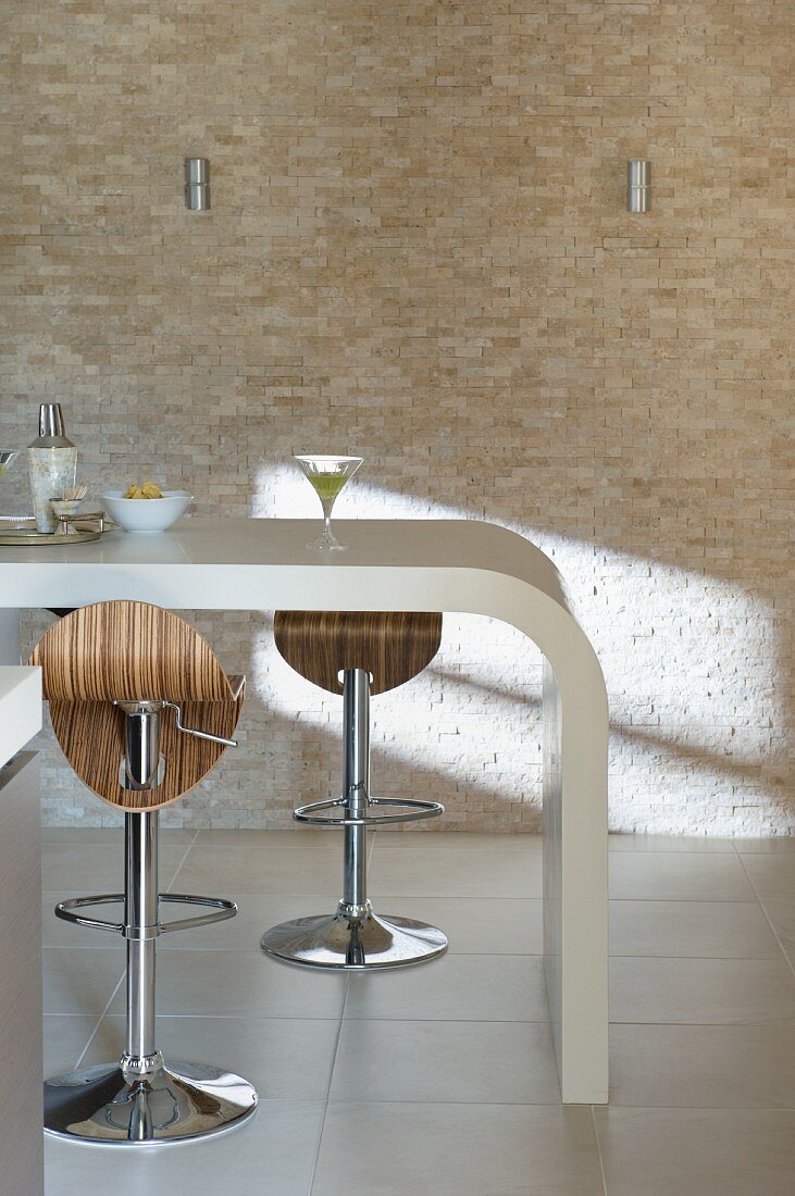 Curved kitchen counter and bar stools