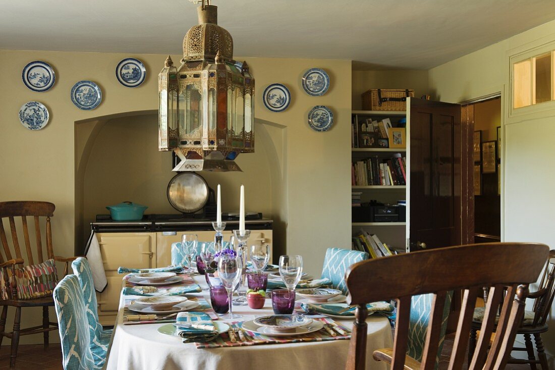 Moroccan lamp hangs in kitchen of fabric designer Richard Smith in East Sussex