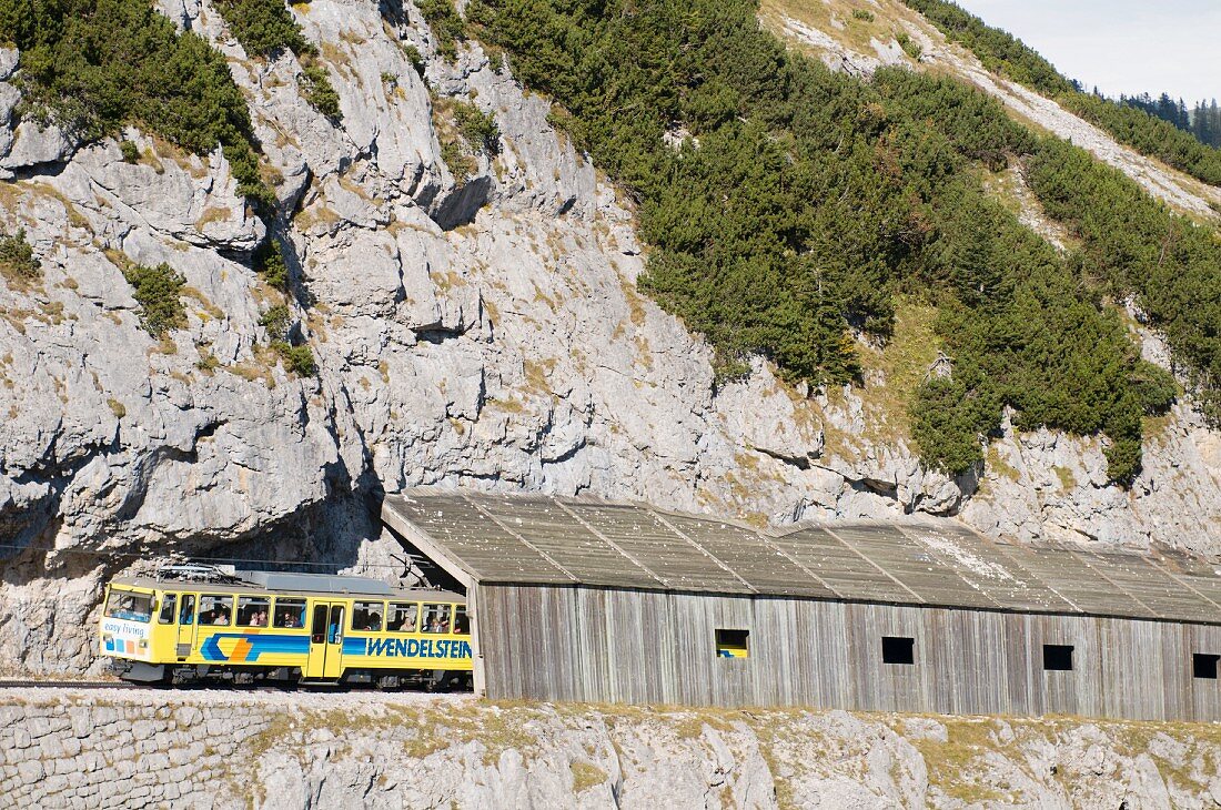 Wendelstein rack railway in front of a mountain face (Germany)