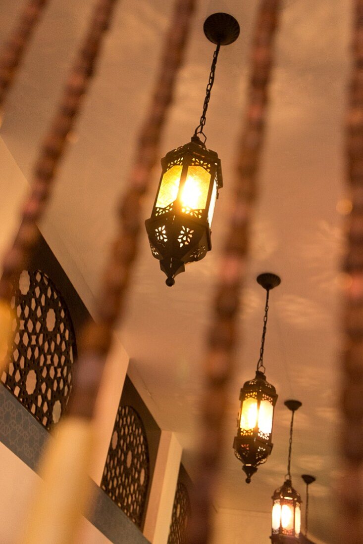 Wooden bead curtain with oriental lanterns