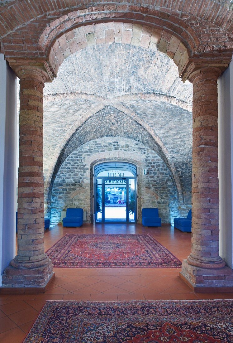 Hotel lobby with antique, Romanesque vaulting