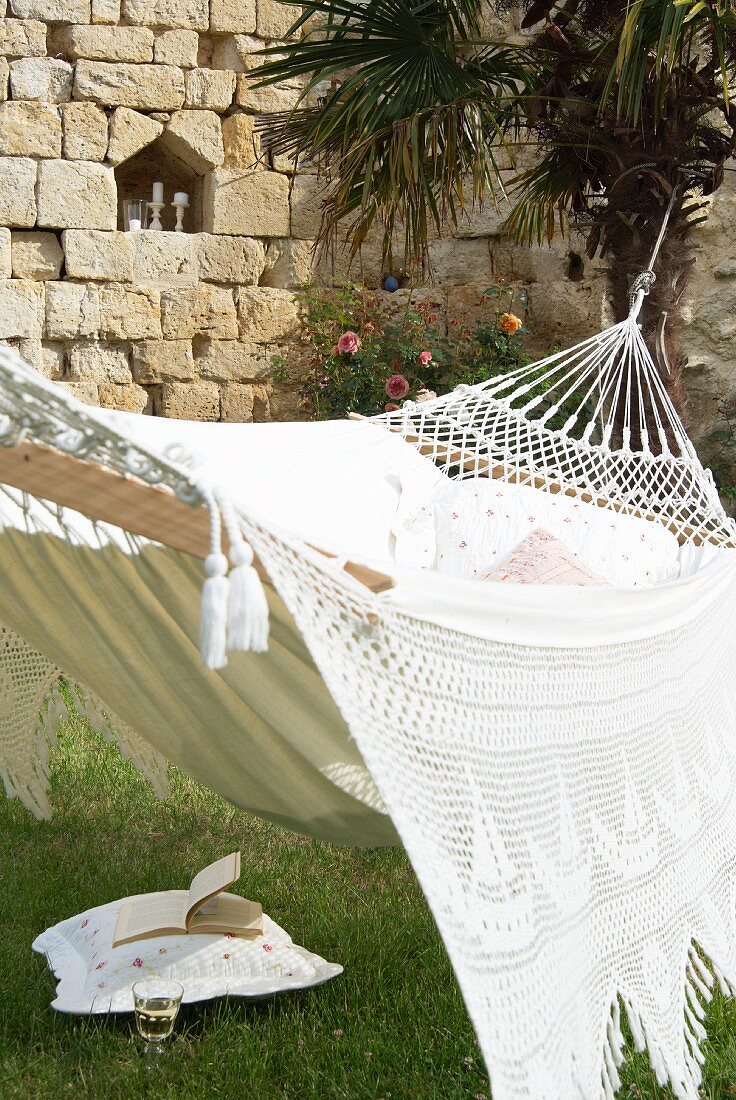 White hammock in garden of Château Maignaut (Pyrenees, France)