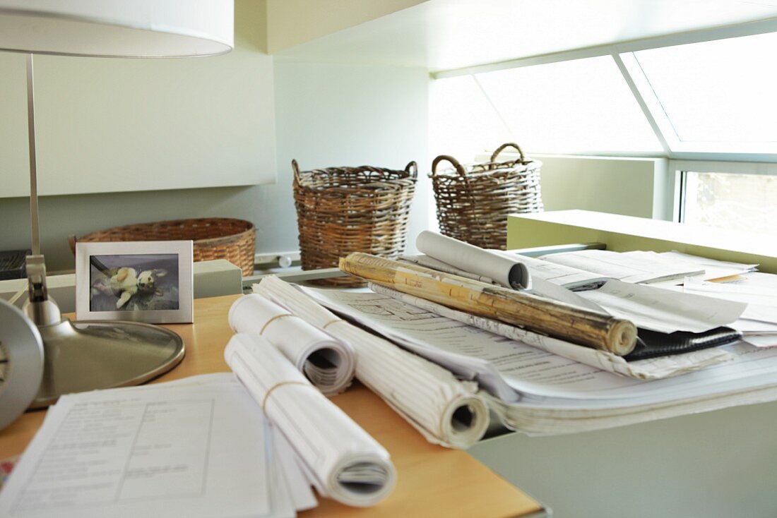 Paper rolls on desk in office