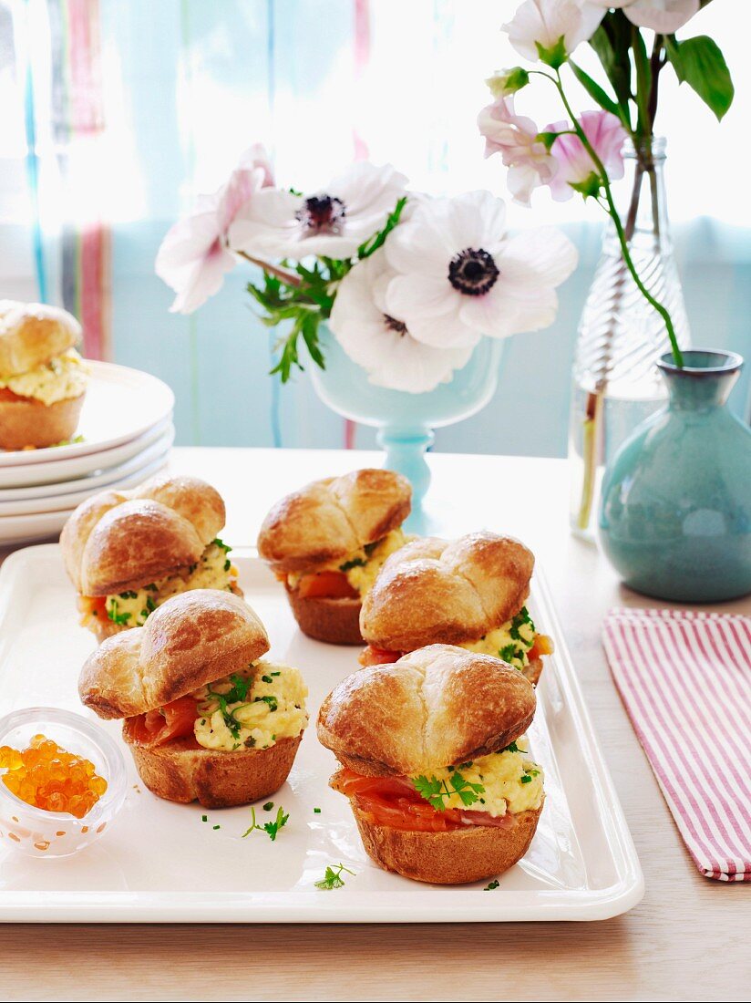 Brioche rolls with scrambled egg and smoked trout