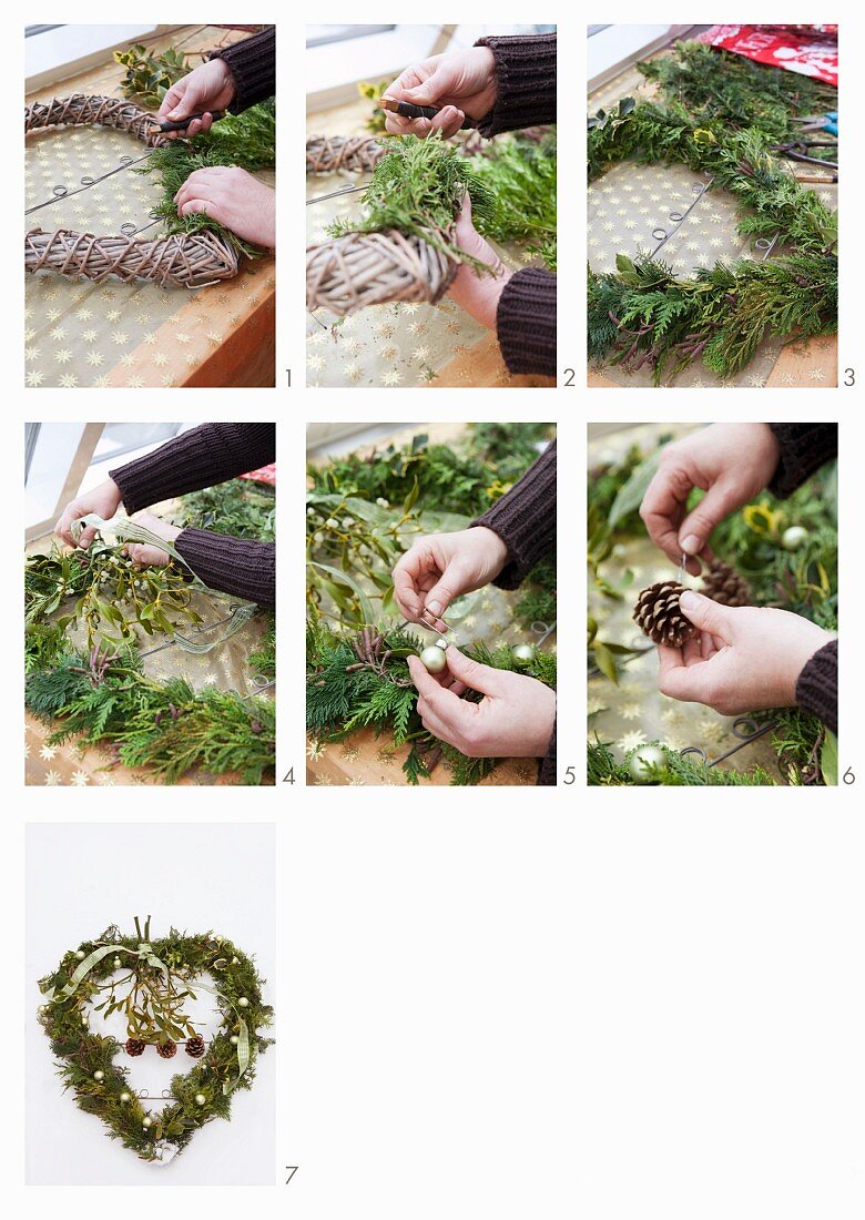 A wreath being made from evergreen, mistletoe, ivy and pine cones