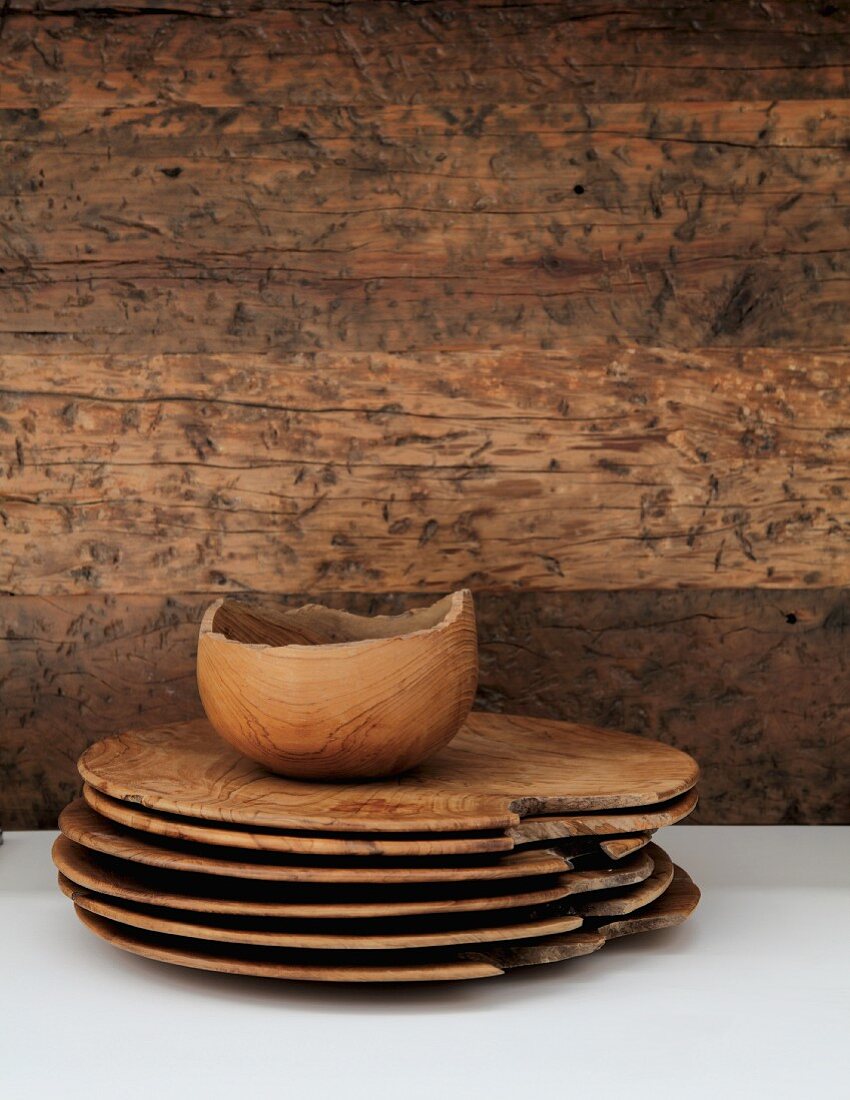Rustic dishes in front of rustic wooden wall