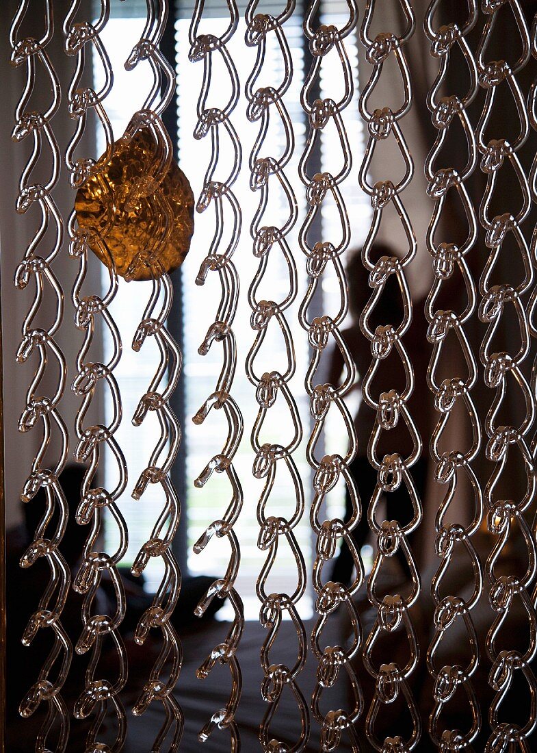 Close-up of chain curtain made from acrylic links