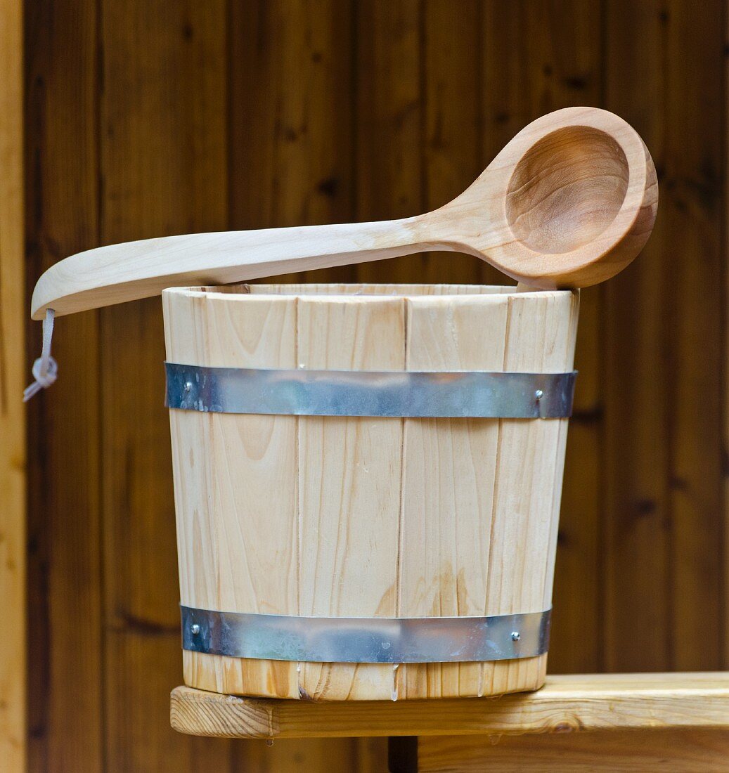 Wooden water bucket and ladle for the sauna