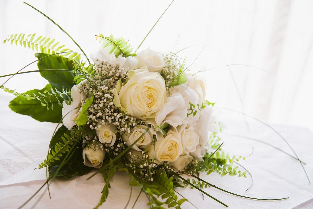 Bridal bouquet with white and yellow roses