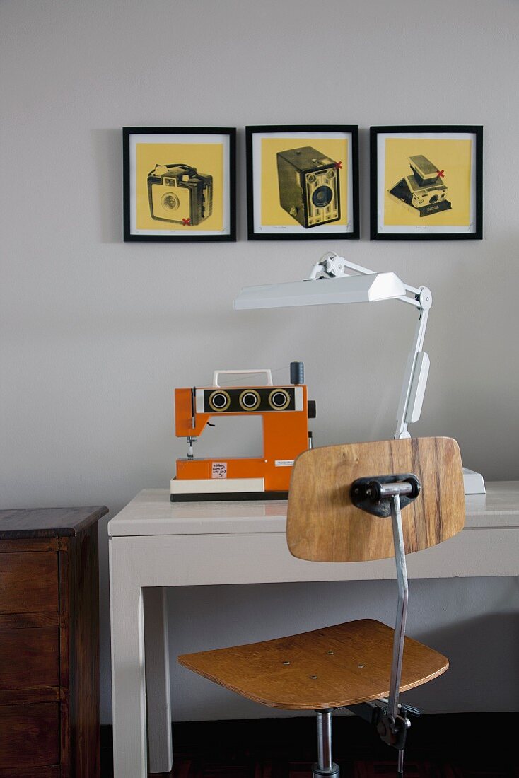 Sewing table with sewing machine, table lamp & wooden swivel chair