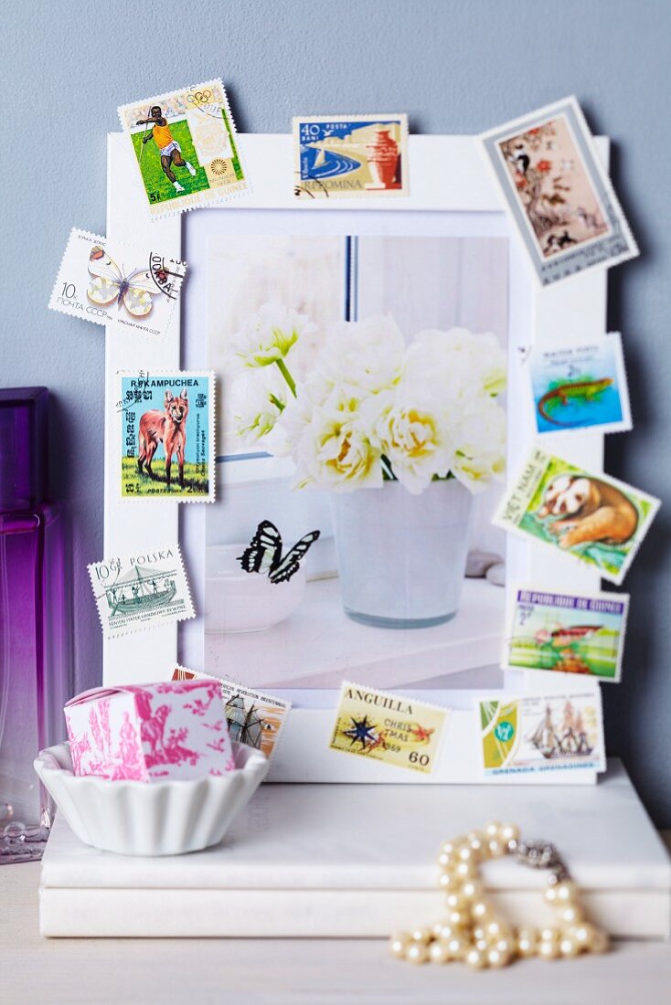 Picture frame decorated with postage stamps