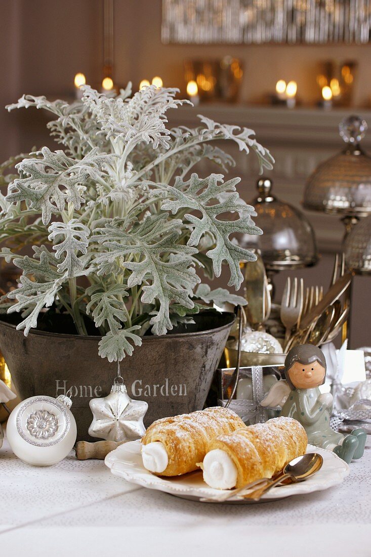 Cream-filled pastry horns on festively decorated table