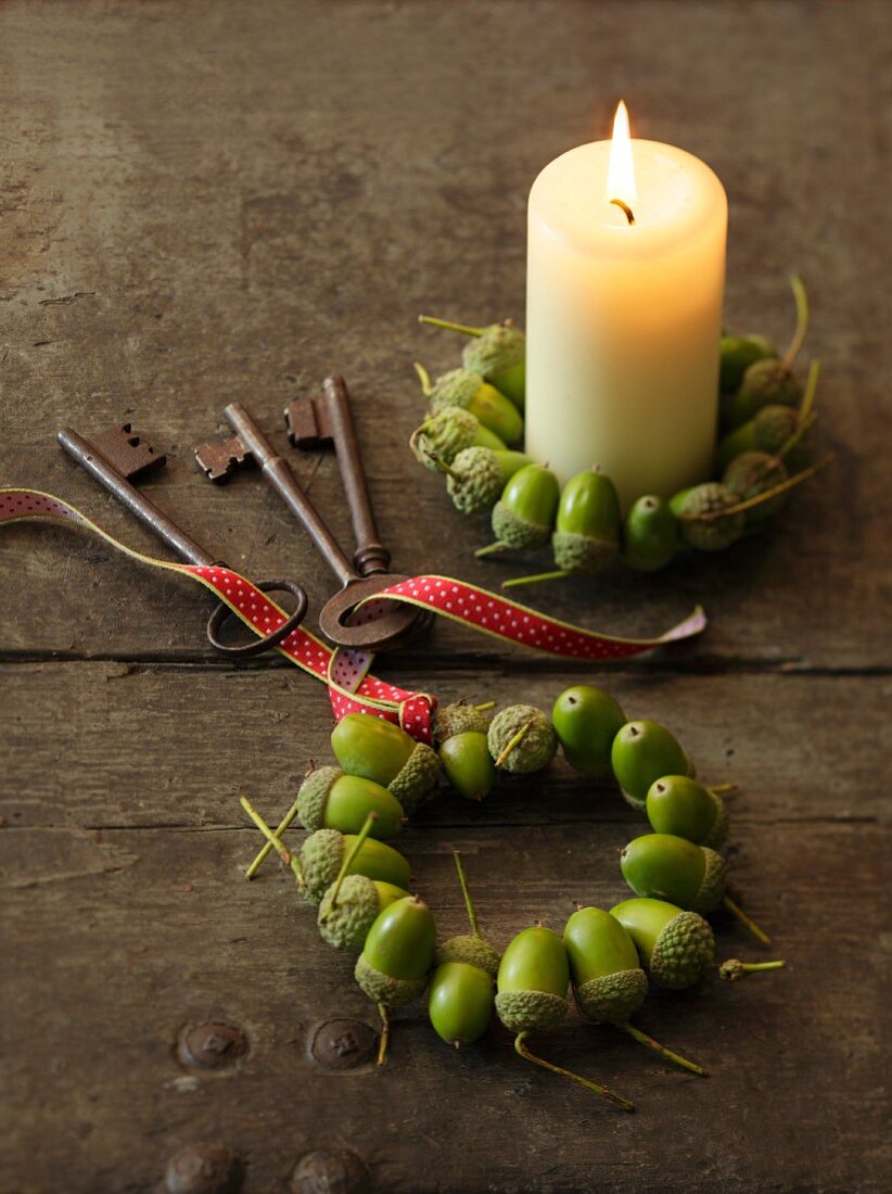Candle with wreath of acorns