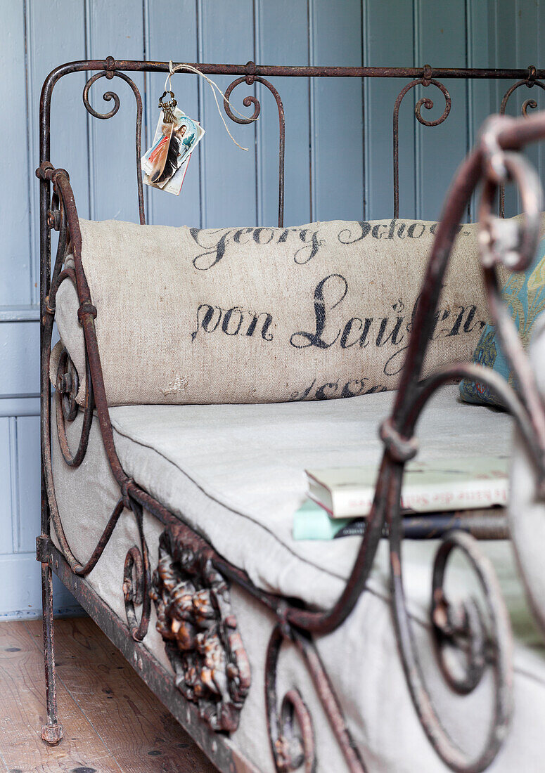 Vintage metal daybed with printed cushion