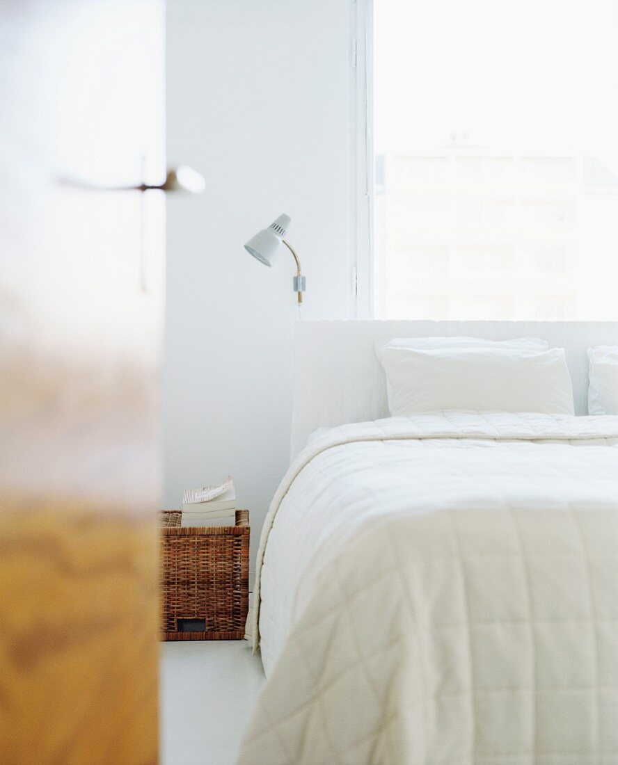 A bedroom in pale colours