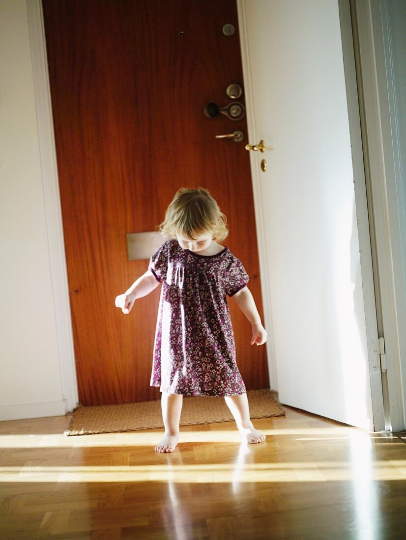 A girl dancing in the hallway, Sweden.