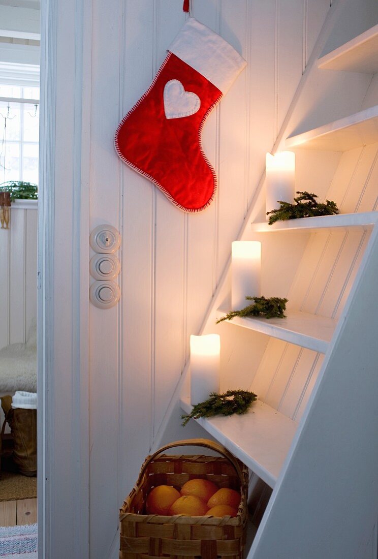 Candles & Christmas decorations on wooden ship ladder stairs