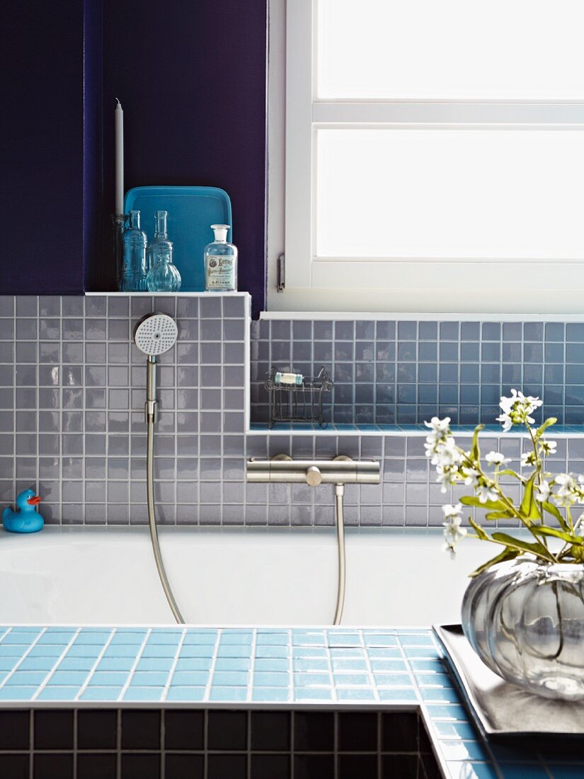 Mosaic-tiled bathroom in various shades of blue
