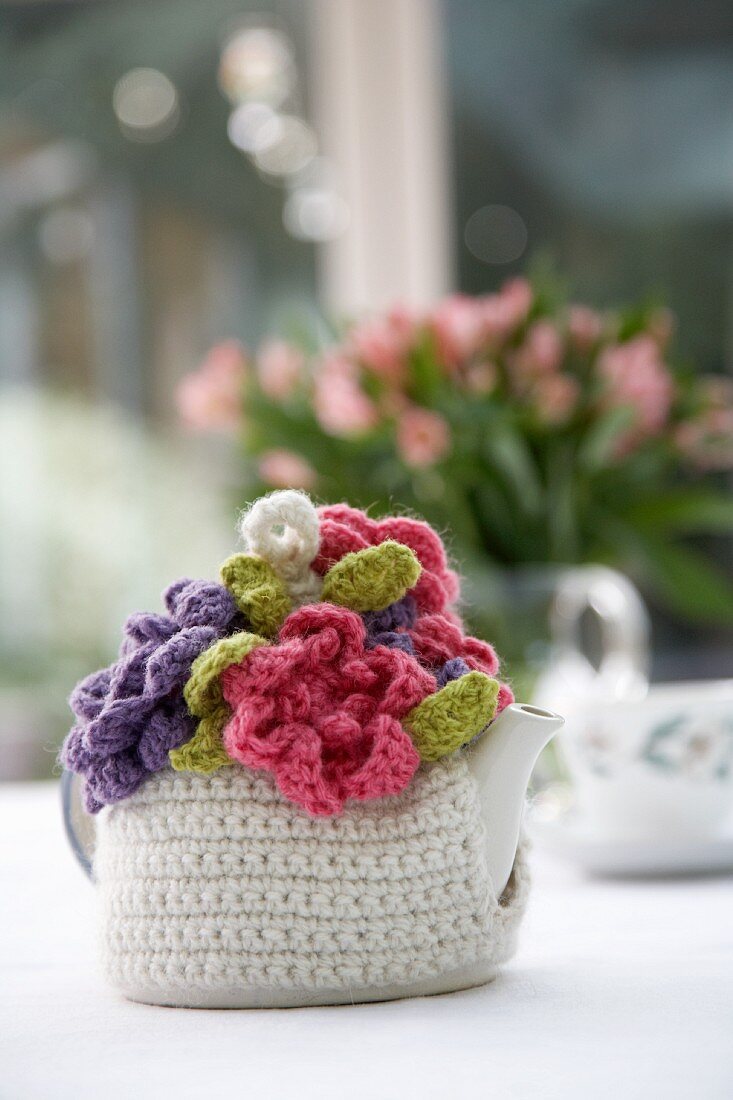 Hand-made, yarn tea cosy