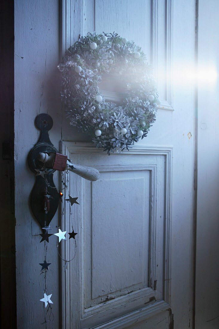 Christmas wreath on vintage interior door