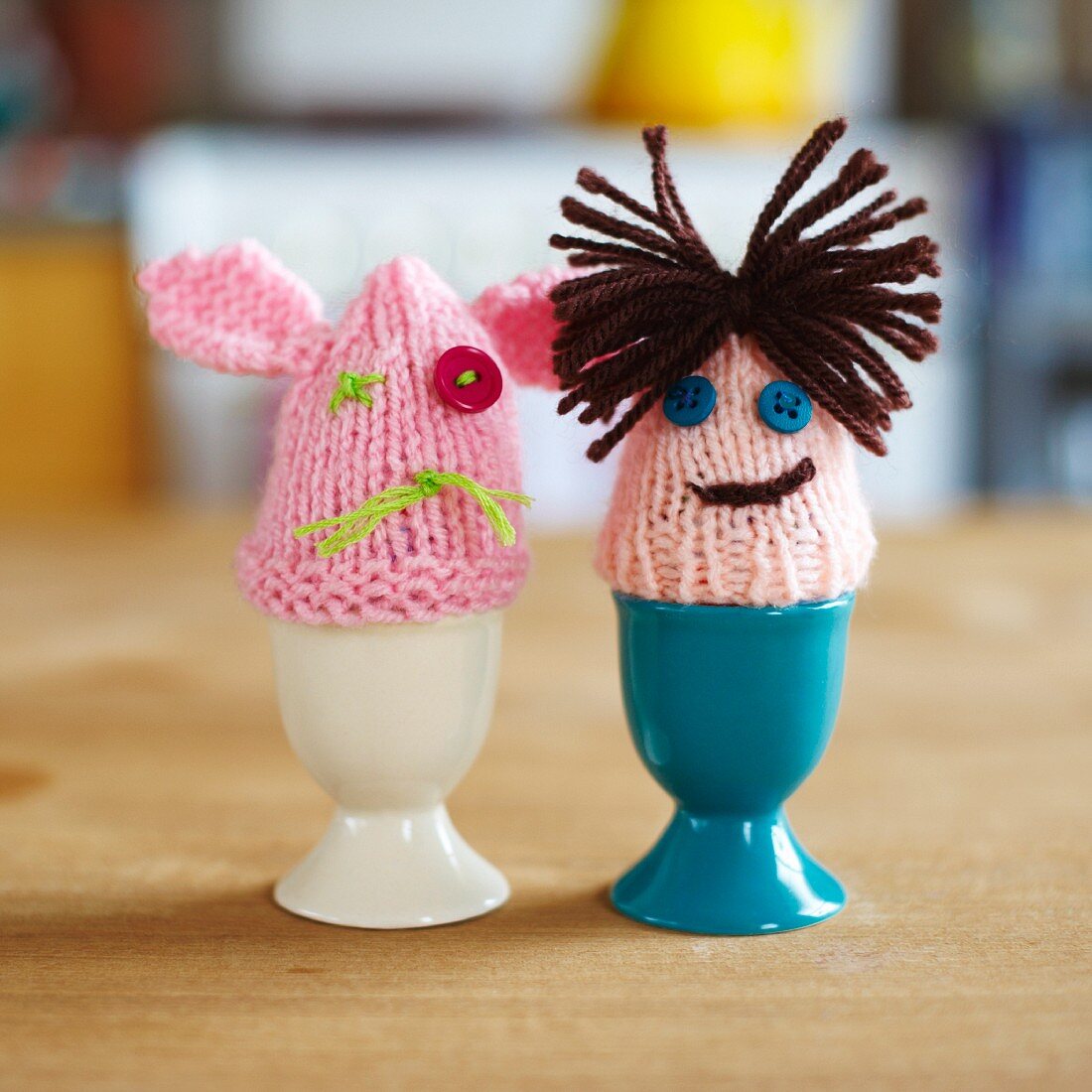 Knitted egg warmers couple