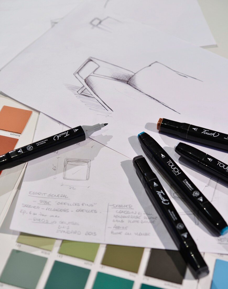 Pens, colour charts & design drafts