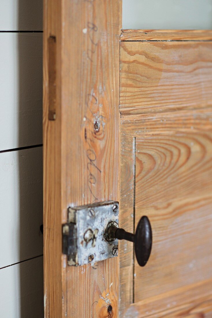 Detail of lock on rustic interior door
