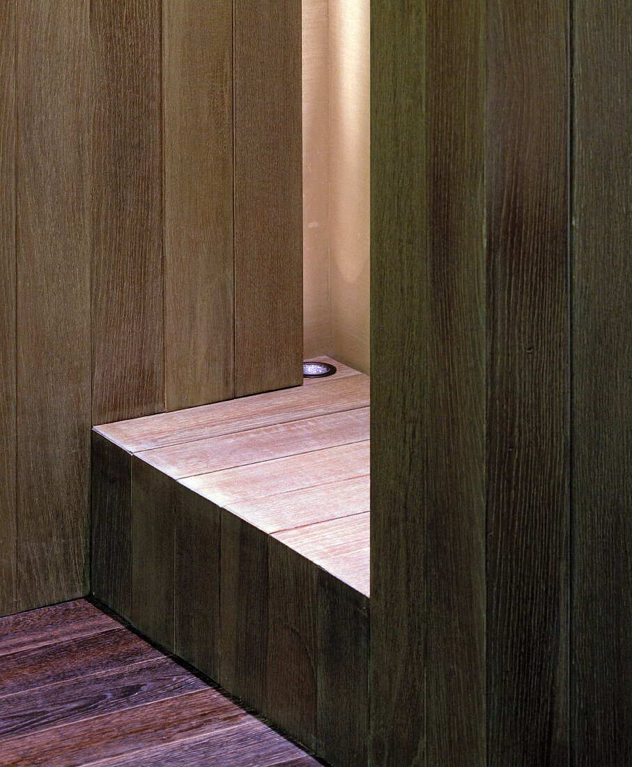 Detail of a wood built-in with built-in spotlighting