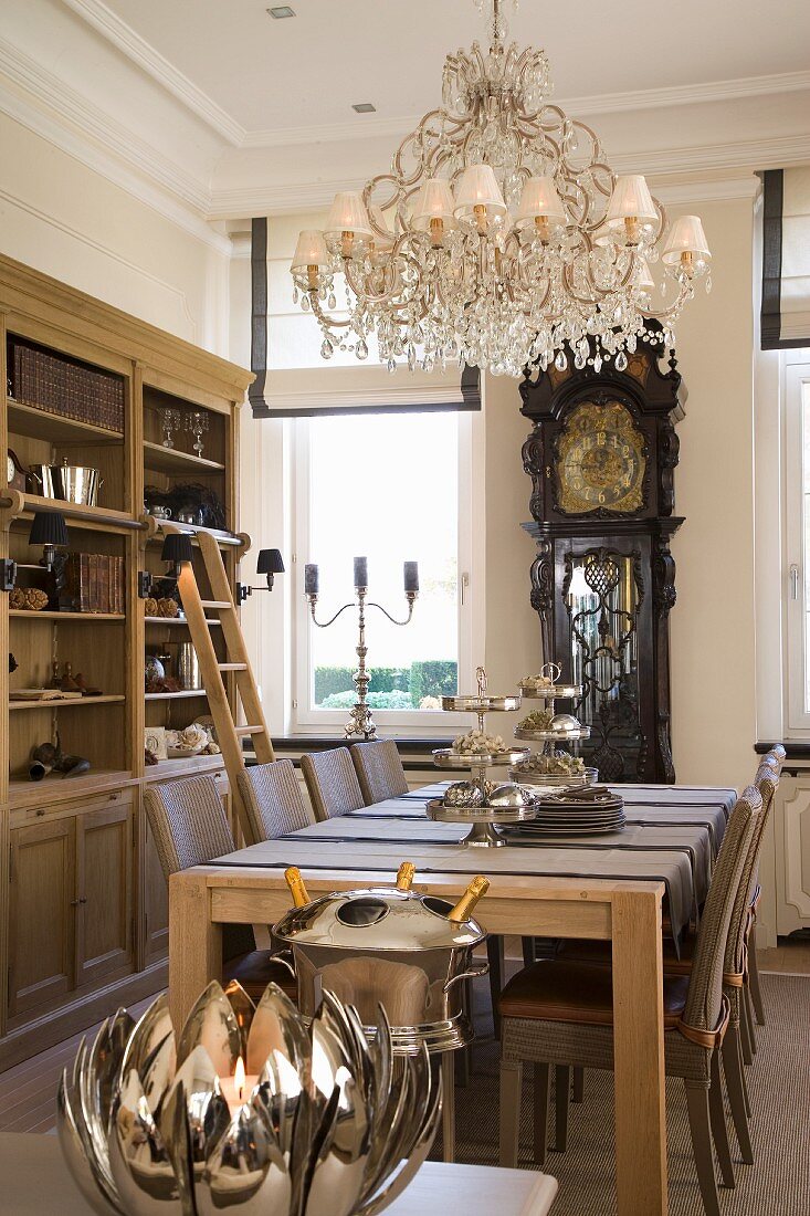 Antique furniture and country-house elements in traditional dining room