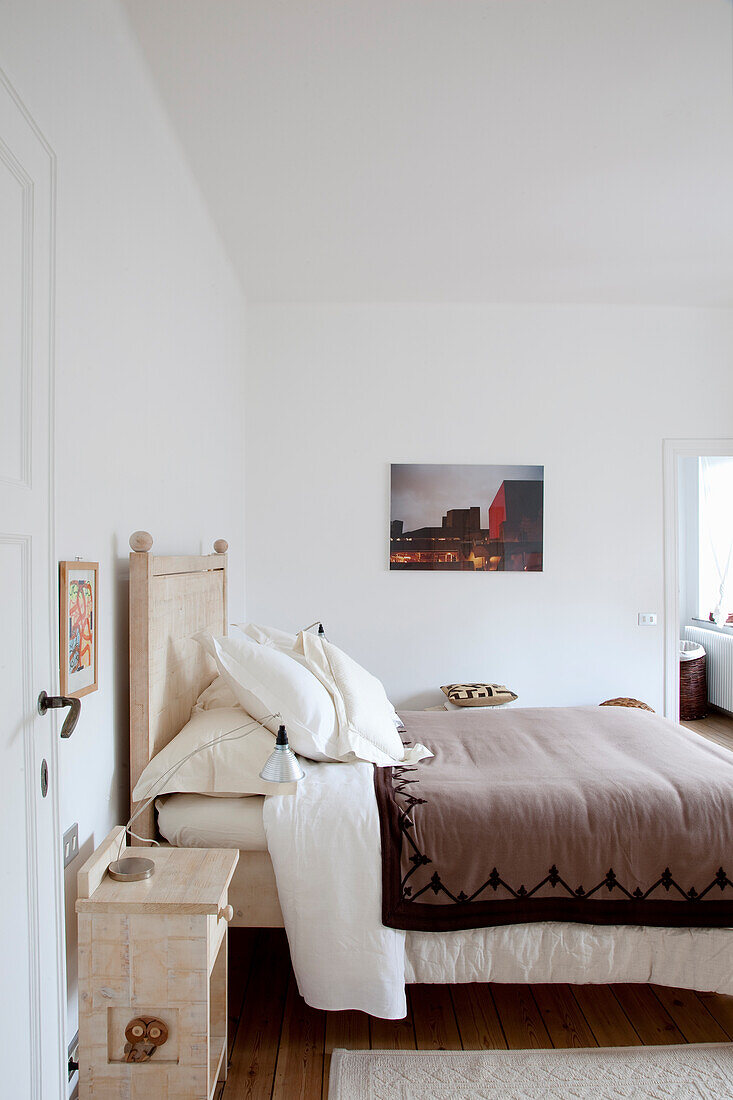 Brightly designed bedroom in natural tones