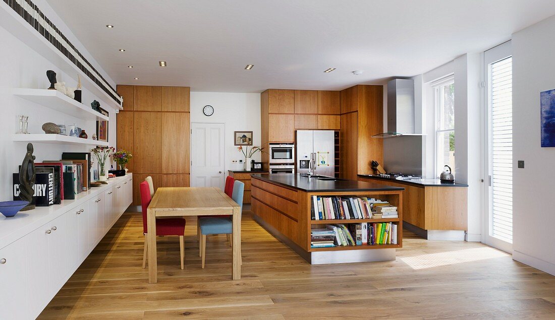 Open-plan living space with dining area and multi-functional kitchen island