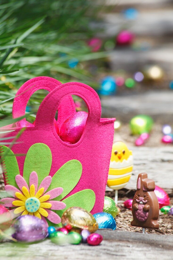 Pink felt bag with chocolate Easter eggs