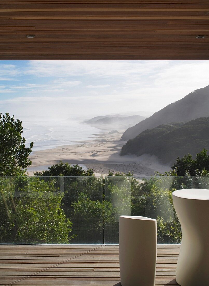 Coastal view from terrace with glass balustrade