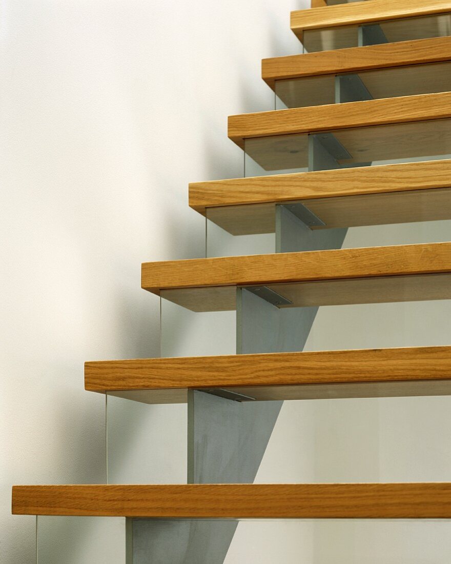 Wooden stair treads on stainless steel stringer