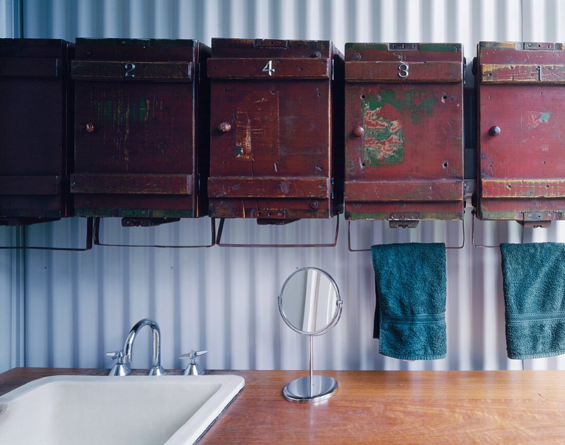 Antique cupboards in modern bathroom