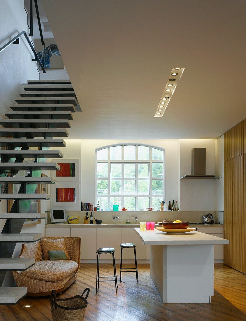 Open-plan kitchen & floating staircase