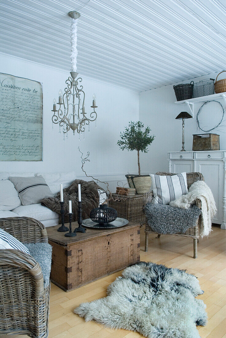 Cozy country-style living room with rattan and wooden furniture