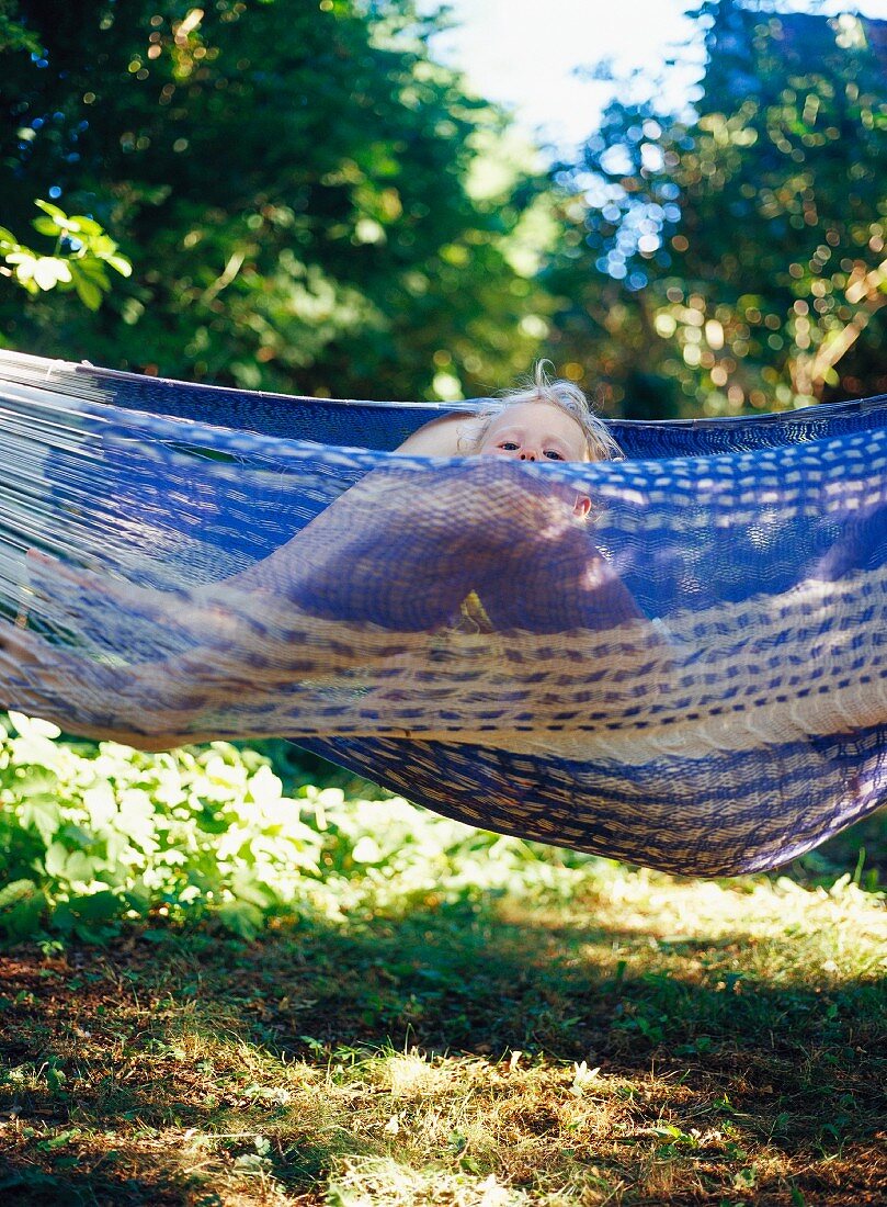 Toddler and mother in hammock
